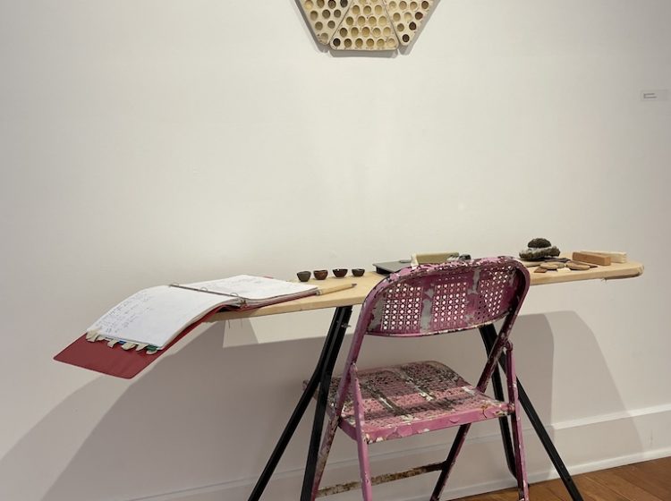 16-Henderson, Annette 2026 Clay Analysis Space, (table, chair found objects)